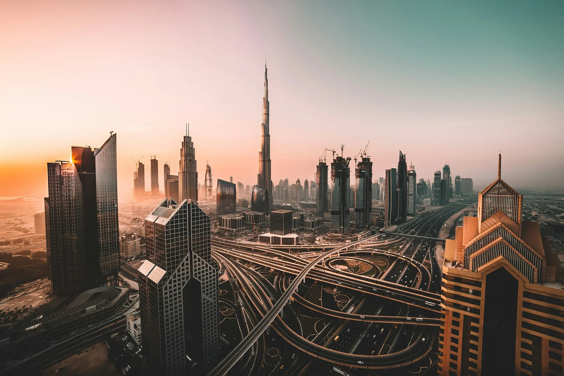 Dubai skyline and business district at sunrise